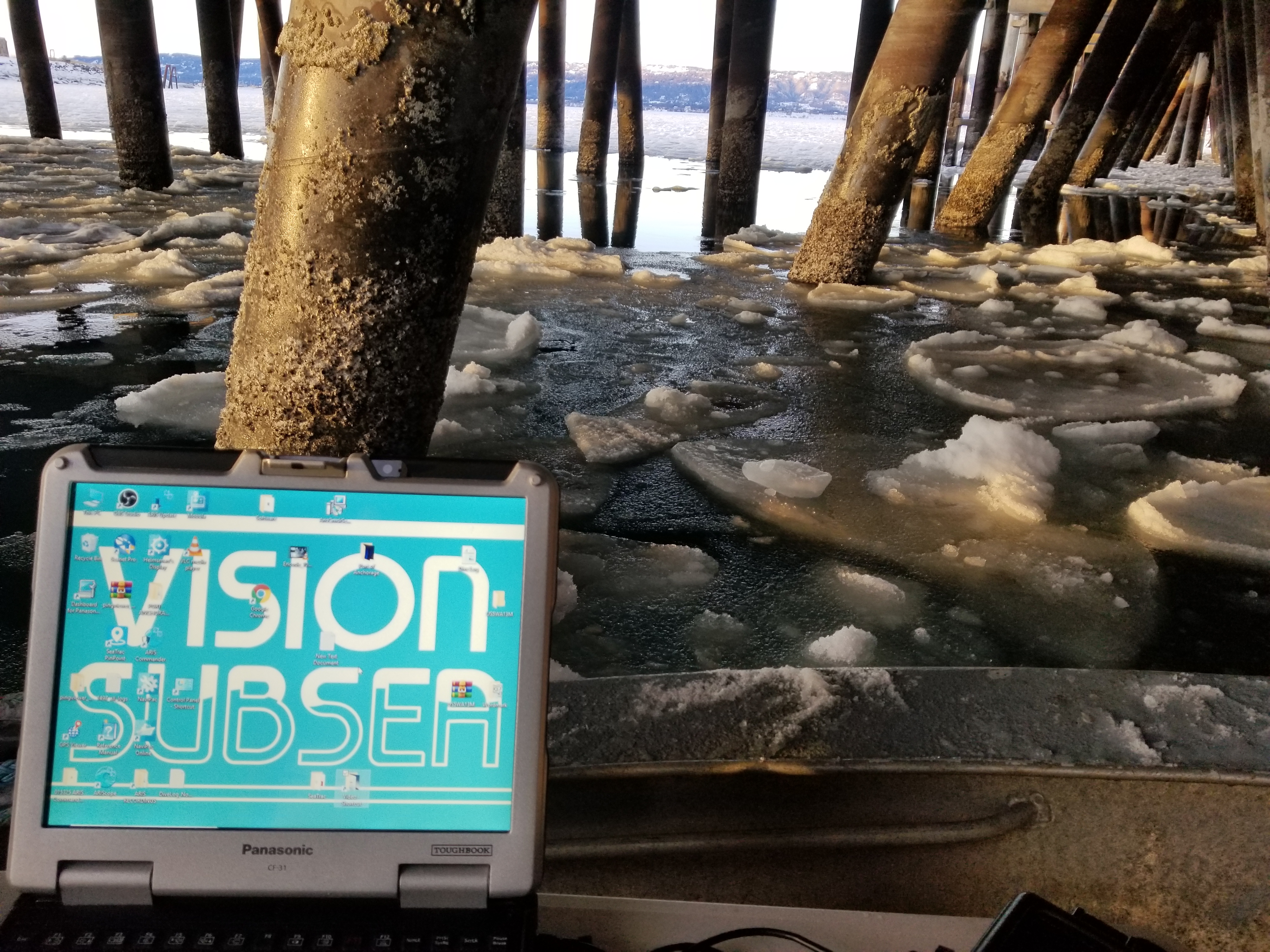 Vision Subsea logo against icy water background